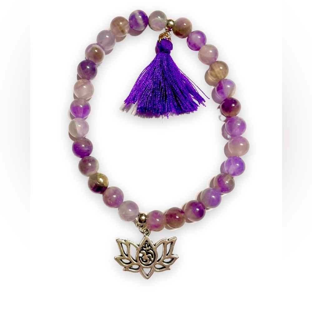 Amethyst bracelet with lotus and Om charm